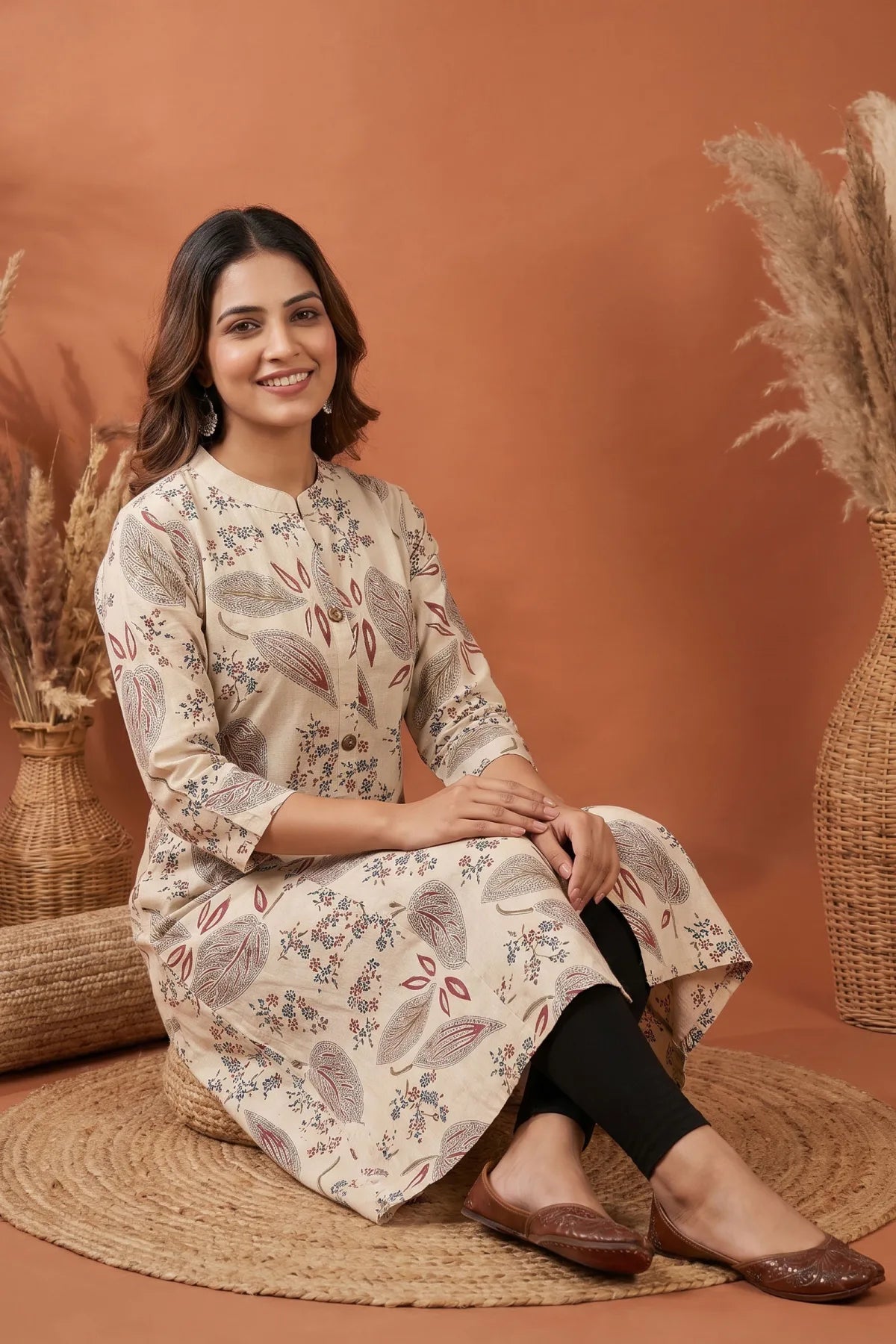 Cream Cotton A Line Princess Cut Kurta with Leaf Print